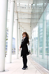 Image showing portrait of a young business woman in an office 