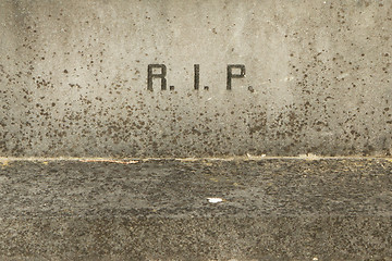 Image showing The letters RIP on an old grave