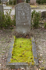 Image showing An old grave on a graveyard