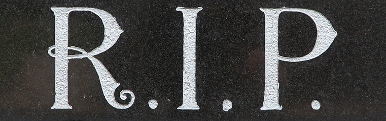 Image showing The letter RIP on a grave