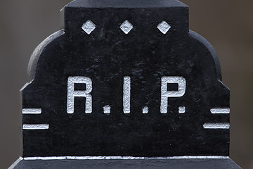 Image showing The letter RIP on a grave