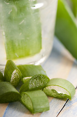 Image showing aloe vera juice with fresh leaves