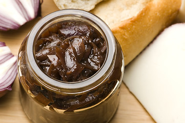 Image showing Onion jam in jar, goat's cheese and fresh bread