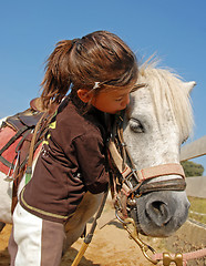 Image showing child and pony