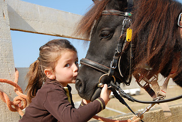 Image showing little girl and her pony