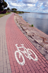 Image showing Bicycle path near lake.
