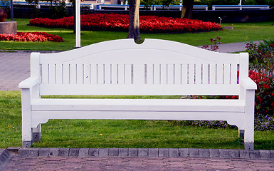 Image showing White bench in park.