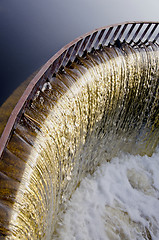 Image showing Water runs through dam.