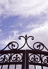 Image showing Sky view through gates.