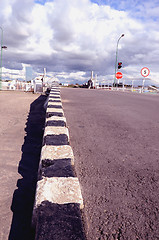 Image showing Striped border, traffic light, stop sign.