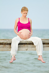 Image showing pregnant woman on beach