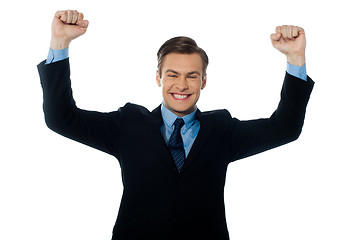 Image showing Businessman celebrating success with arms up