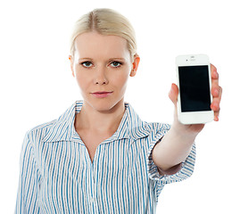 Image showing Corporate female communicating on phone against white background