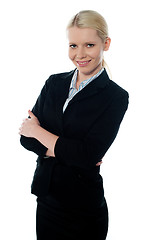 Image showing Smiling young femlae CEO posing with folded arms