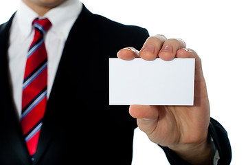 Image showing Closeup shot of a man showing business card