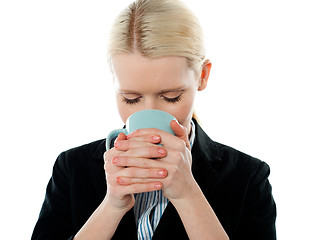 Image showing Businesswoman drinking coffee