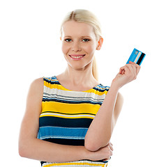 Image showing Smiling young girl holding debit-card