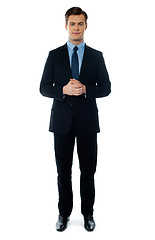 Image showing Young handsome businessperson posing