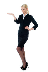 Image showing Full pose of charming young businesswoman