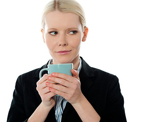 Image showing Coporate woman holding coffee mug