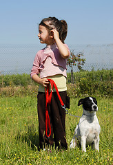 Image showing little girl and dog