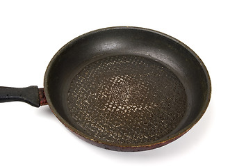 Image showing Dirty old frying pan on white background