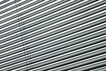 Image showing Semi-closed metallic blinds