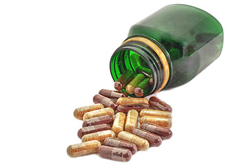 Image showing Capsules Pills Medicine with green bottle