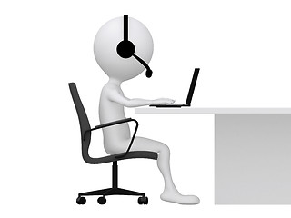 Image showing A computer customer support person types on a laptop computer 