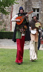 Image showing Troubadours on stilts