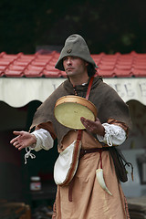 Image showing Portrait of a troubadour on stilts