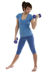 Image showing Beautiful girl with dumbbells