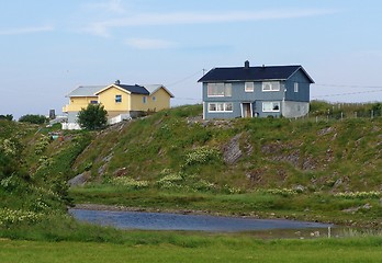 Image showing Blue and yellow house.