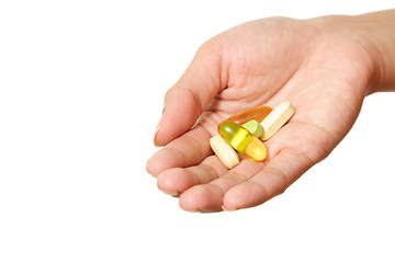 Image showing Holding vitamins
