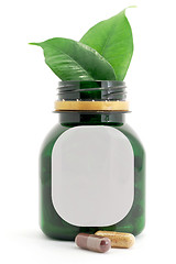 Image showing Capsules Pills Bio and Bottle with green leaf