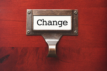 Image showing Lustrous Wooden Cabinet with Change File Label