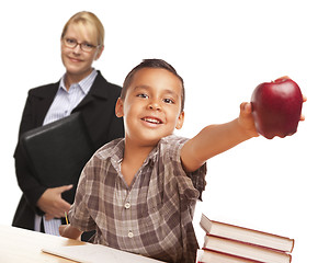 Image showing Hispanic Student Boy with Apple and Female Adult Behind.