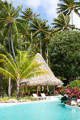 Image showing deck chairs by the pool