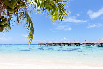 Image showing overwater bungalows in the lagoon
