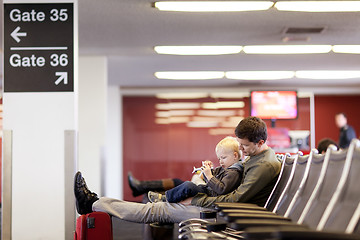 Image showing father and son at the airport