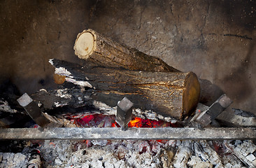 Image showing fireplace with burning wood logs