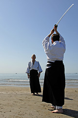 Image showing training of Aikido on the beach