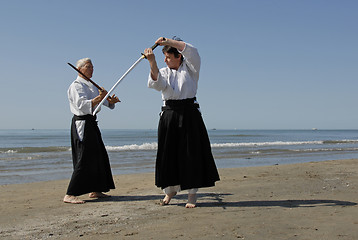 Image showing training of Aikido on the beach