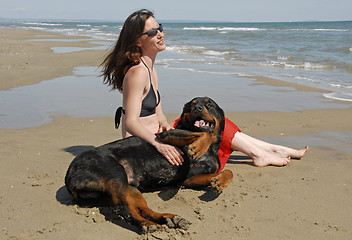 Image showing girl and rottweiler