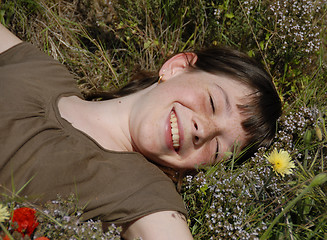 Image showing smiling girl in field