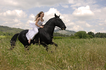 Image showing riding wedding woman