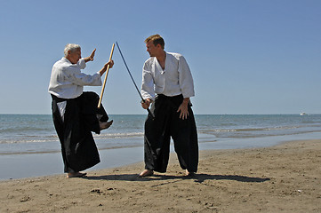 Image showing training of Aikido on the beach