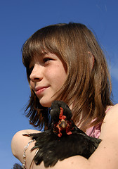 Image showing young girl and chicken