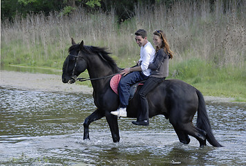 Image showing riding lovers