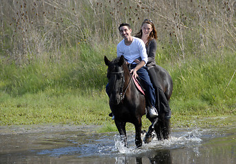 Image showing riding lovers